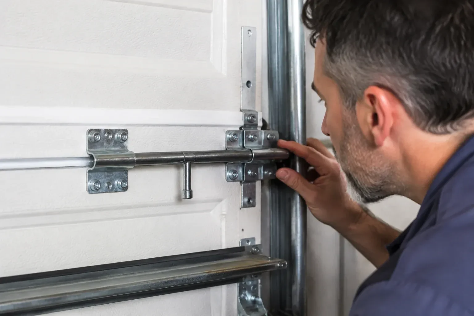Illustrative garage doors scene; not an actual job — Garage Door Manual Lock Repair, New Tecumseth
